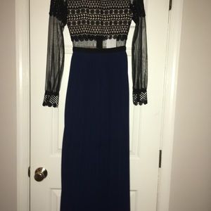 Sheer dress with lace sleeves and midriff